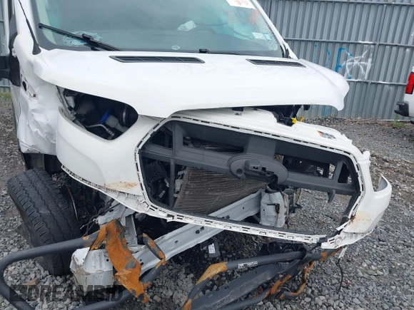 2020 Ford Transit Cargo with VIN 1FTYE1Y86LKA08570, listed as a IAAI auction lot 41571478 with 21,405 mi miles and . Bid and sale history available at DreamBid. Image 6.