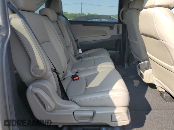 2019 Honda Odyssey EX-L z VIN 5FNRL6H77KB090836, wystawiony jako Copart lot #59514165 z przebiegiem Nie podano mil oraz Szkoda całkowita • Salvage title. Historia ofert i sprzedaży dostępna na DreamBid. Obrazek 11.