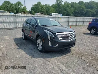 2019 Cadillac XT5 Premium Luxury AWD with VIN 1GYKNFRS9KZ223065, listed as a Copart auction lot 60902645 with 101,168 mi miles and Salvage title. Bid and sale history available at DreamBid. Image 14.