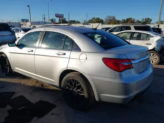 2012 Chrysler 200 S with VIN 1C3CCBHGXCN188538, listed as a IAAI auction lot 41085313 with 107,002 mi miles and . Bid and sale history available at DreamBid. Image 3.
