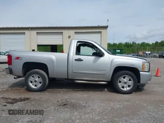 2011 Chevrolet Silverado 1500 LT with VIN 1GCNKSE02BZ254165, listed as a IAAI auction lot 42118988 with 102,480 mi miles and . Bid and sale history available at DreamBid. Image 13.
