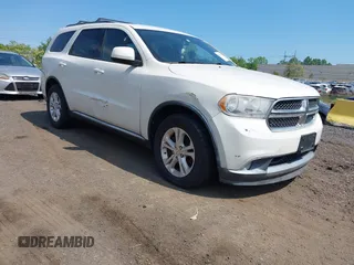 2012 Dodge Durango SXT z VIN 1C4RDJAG0CC294998, wystawiony jako IAAI lot #42230396 z przebiegiem 62 963 mil mil oraz . Historia ofert i sprzedaży dostępna na DreamBid. Obrazek 1.