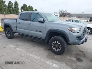 2021 Toyota Tacoma 4WD SR5 with VIN 3TMDZ5BN8MM114229, listed as a IAAI auction lot 41583843 with 46,927 mi miles. Bid and sale history available at carsss.com. Image 1.