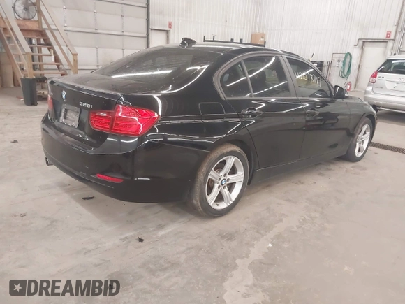 2014 BMW 3 Series 328i xDrive with VIN WBA3B3C5XEJ980450, listed as a IAAI auction lot 42078717 with 108,763 mi miles. Bid and sale history available at carsss.com. Image 4.