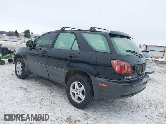1999 Lexus RX 300 Luxury SUV with VIN JT6HF10U6X0032219, listed as a IAAI auction lot 41582634 with 180,584 mi miles. Bid and sale history available at carsss.com. Image 3.