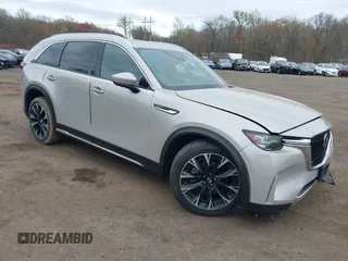 2024 Mazda CX-90 Premium Plus with VIN JM3KKEHAXR1103857, listed as a IAAI auction lot 42081288 with 45,930 mi miles and . Bid and sale history available at DreamBid. Image 1.