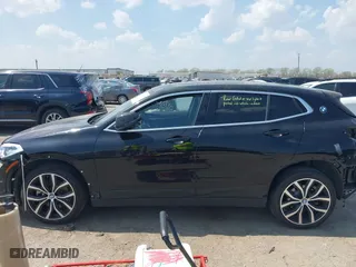 2018 BMW X2 xDrive28i with VIN WBXYJ5C33JEF80454, listed as a IAAI auction lot 41876188 with 34,596 mi miles. Bid and sale history available at carsss.com. Image 15.