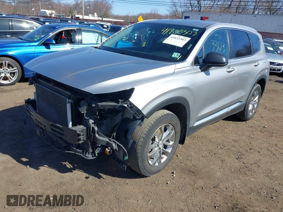 2020 Hyundai Santa Fe SE z VIN 5NMS2CAD7LH269302, wystawiony jako IAAI lot #41833303 z przebiegiem 70 665 mil mil oraz . Historia ofert i sprzedaży dostępna na DreamBid. Obrazek 2.
