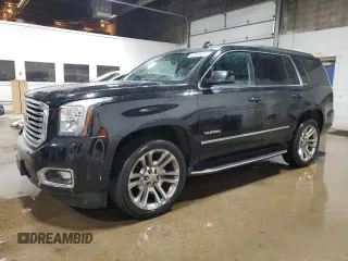 2016 GMC Yukon SLT with VIN 1GKS2BKC1GR440857, listed as a Copart auction lot 52683875 with 171,111 mi miles and Salvage Title. Bid and sale history available at carsss.com. Image 1.