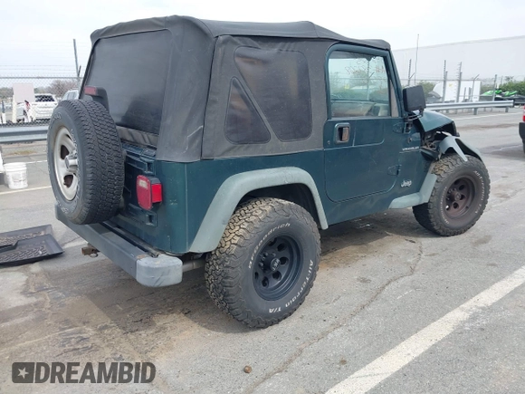 2000 Jeep Wrangler SE with VIN 1J4FA29P0YP728370, listed as a IAAI auction lot 41788463 with 186,995 mi miles. Bid and sale history available at carsss.com. Image 4.