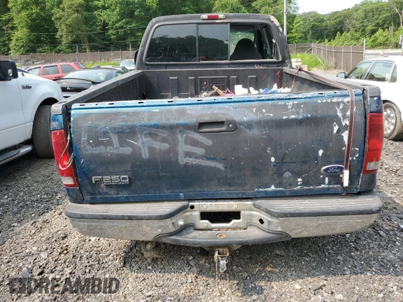 2000 Ford F-250 XL с VIN 1FTNX21L7YEC94100, выставлен на аукционе Copart как лот 58923025 с пробегом 199 015 миль миль и Списание • Salvage title. История ставок и продаж доступна на DreamBid. Изображение 6.