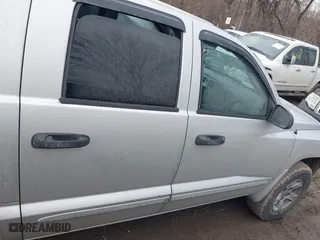 2005 Dodge Dakota Laramie with VIN 1D7HE58N05S244878, listed as a IAAI auction lot 41662513 with 171,323 mi miles. Bid and sale history available at carsss.com. Image 13.