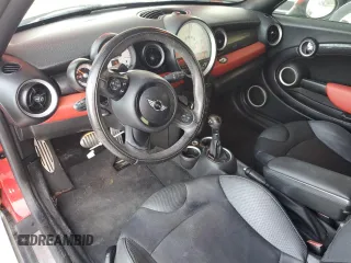2013 MINI Roadster S z VIN WMWSY3C56DT593875, wystawiony jako Copart lot #74982124 z przebiegiem 64 622 mil mil oraz Szkody całkowita. Historia ofert i sprzedaży dostępna na DreamBid. Obrazek 8.