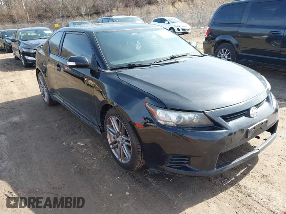 2013 Scion tC with VIN JTKJF5C74D3063012, listed as a IAAI auction lot 41776592 with 142,071 mi miles. Bid and sale history available at carsss.com. Image 1.