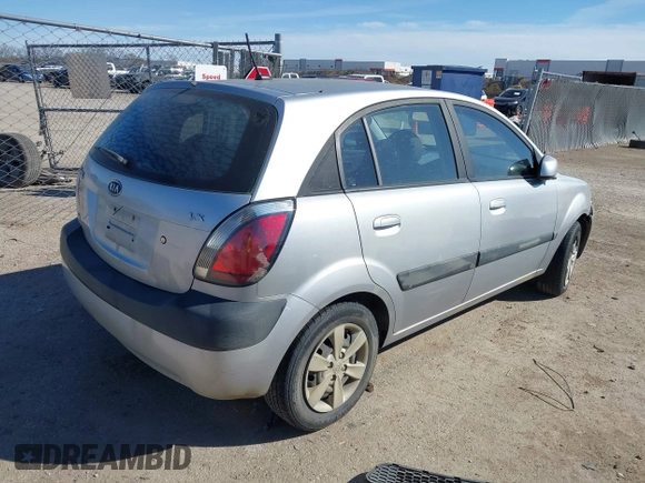 2009 Kia Rio LX with VIN KNADE243596530314, listed as a IAAI auction lot 41681050 with 114,831 mi miles. Bid and sale history available at carsss.com. Image 4.