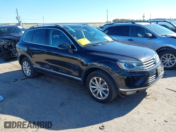2016 Volkswagen Touareg Sport with VIN WVGEF9BP4GD012265, listed as a IAAI auction lot 41208383 with 69,205 mi miles and . Bid and sale history available at DreamBid. Image 1.