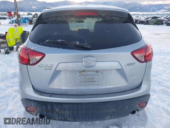 2016 Mazda CX-5 Touring with VIN JM3KE4CY9G0904000, listed as a IAAI auction lot 41186630 with 73,900 mi miles. Bid and sale history available at carsss.com. Image 16.