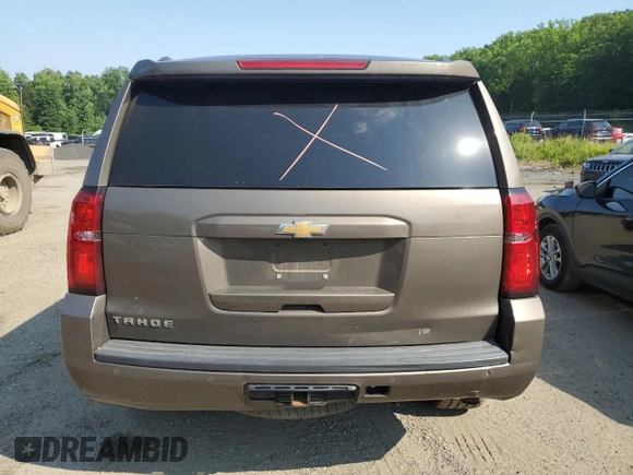 2016 Chevrolet Tahoe LT with VIN 1GNSCBKCXGR241872, listed as a Copart auction lot 59628315 with 156,862 mi miles and Salvage title. Bid and sale history available at DreamBid. Image 6.