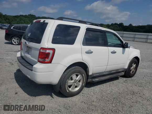 2012 Ford Escape XLT with VIN 1FMCU9D73CKC29497, listed as a Copart auction lot 63211965 with 142,134 mi miles and Salvage title. Bid and sale history available at DreamBid. Image 3.