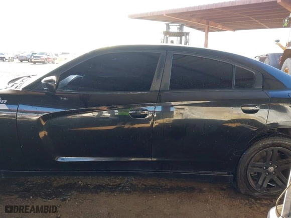 2012 Dodge Charger SE with VIN 2C3CDXBG0CH117487, listed as a IAAI auction lot 41640710 with 183,541 mi miles. Bid and sale history available at carsss.com. Image 14.