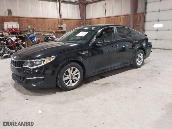 2018 Kia Optima LX with VIN 5XXGT4L30JG233167, listed as a IAAI auction lot 41605135 with 82,337 mi miles. Bid and sale history available at carsss.com. Image 2.