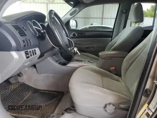 2009 Toyota Tacoma PreRunner with VIN 3TMKU72N89M021378, listed as a Copart auction lot 57142405 with 199,745 mi miles and Salvage title. Bid and sale history available at DreamBid. Image 7.