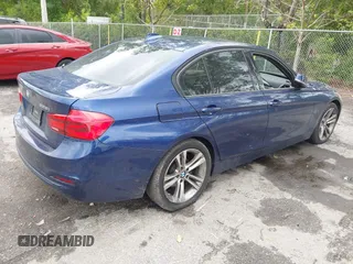 2016 BMW 3 Series 328i with VIN WBA8E9C53GK648802, listed as a IAAI auction lot 41991374 with 104,824 mi miles and . Bid and sale history available at DreamBid. Image 4.