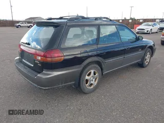 1997 Subaru Legacy Outback with VIN 4S3BG6852V7631841, listed as a IAAI auction lot 42652492 with 339,391 mi miles and . Bid and sale history available at DreamBid. Image 4.