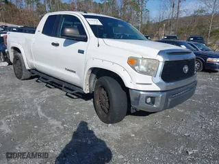 2014 Toyota Tundra 4WD Truck SR with VIN 5TFUW5F1XEX370559, listed as a IAAI auction lot 41587074 with 176,057 mi miles. Bid and sale history available at carsss.com. Image 1.