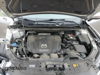 2015 Mazda CX-5 Sport z VIN JM3KE2BE4F0459532, wystawiony jako Copart lot #61049235 z przebiegiem 149 808 mil mil oraz Szkoda całkowita • Salvage title. Historia ofert i sprzedaży dostępna na DreamBid. Obrazek 12.