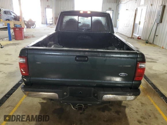 2001 Ford Ranger XLT Appearance with VIN 1FTYR14E71PA81740, listed as a Copart auction lot 48695975 with 203,450 mi miles and Salvage Title. Bid and sale history available at DreamBid. Image 6.