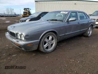 2002 Jaguar XJ with VIN SAJFA12C72LF47096, listed as a Copart auction lot 79412794 with 287,060 mi miles and Clean Title. Bid and sale history available at DreamBid. Image 1.