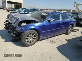2005 Chrysler 300 C z VIN 2C3JA63HX5H651729, wystawiony jako Copart lot #49039965 z przebiegiem 120 143 mil mil oraz Szkoda całkowita • Salvage title. Historia ofert i sprzedaży dostępna na DreamBid. Obrazek 1.