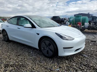 2023 Tesla Model 3 with VIN 5YJ3E1EA9PF569835, listed as a Copart auction lot 50876824 with 25,736 mi miles and Salvage Title. Bid and sale history available at DreamBid. Image 4.