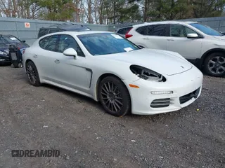 2016 Porsche Panamera 4 z VIN WP0AA2A78GL002029, wystawiony jako IAAI lot #41644555 z przebiegiem 54 915 mil mil oraz . Historia ofert i sprzedaży dostępna na DreamBid. Obrazek 1.