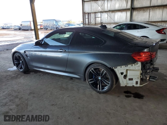2015 BMW M4 with VIN WBS3R9C54FK335119, listed as a Copart auction lot 42120434 with 57,384 mi miles. Bid and sale history available at carsss.com. Image 2.