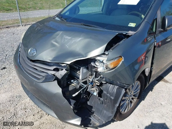 2012 Toyota Sienna XLE AAS with VIN 5TDYK3DC4CS270174, listed as a IAAI auction lot 41961016 with 342,373 mi miles. Bid and sale history available at carsss.com. Image 17.