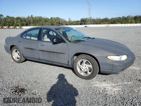 1997 Pontiac Grand Prix SE with VIN 1G2WJ52K5VF263791, listed as a Copart auction lot 78865814 with 134,430 mi miles and Salvage Title. Bid and sale history available at carsss.com. Image 4.