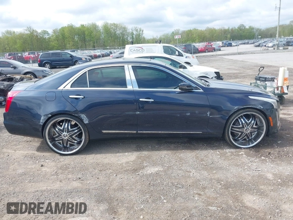 2015 Cadillac CTS Luxury AWD with VIN 1G6AX5SX5F0119102, listed as a IAAI auction lot 42231015 with 106,643 mi miles and . Bid and sale history available at DreamBid. Image 13.