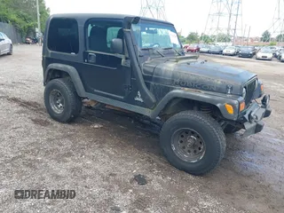 2004 Jeep Wrangler Sport z VIN 1J4FA49S94P792689, wystawiony jako IAAI lot #42394196 z przebiegiem Nie podano mil oraz . Historia ofert i sprzedaży dostępna na DreamBid. Obrazek 1.