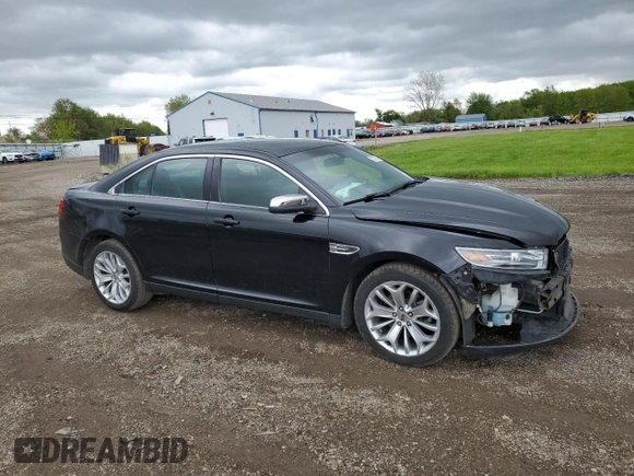 2016 Ford Taurus Limited with VIN 1FAHP2F81GG113129, listed as a Copart auction lot 55770045 with 104,778 mi miles and Salvage title. Bid and sale history available at DreamBid. Image 4.