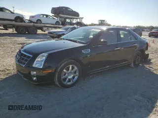 2009 Cadillac STS AWD w/1SB with VIN 1G6DD67V690120833, listed as a Copart auction lot 42502345 with 100,250 mi miles and Salvage Title. Bid and sale history available at carsss.com. Image 1.
