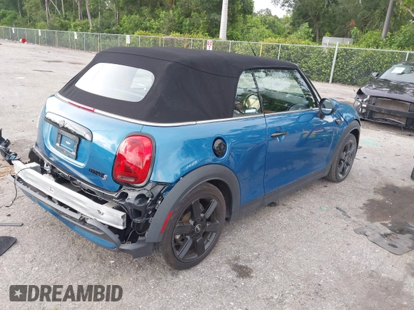2022 MINI Convertible Cooper S z VIN WMW43DL06N3P19784, wystawiony jako IAAI lot #42635816 z przebiegiem 17 053 mil mil oraz . Historia ofert i sprzedaży dostępna na DreamBid. Obrazek 4.