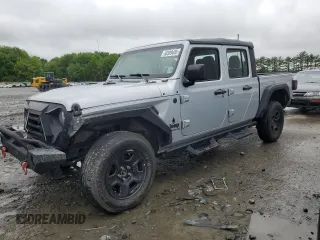 2022 Jeep Gladiator Texas Trail with VIN 1C6HJTAG7NL165957, listed as a Copart auction lot 58309485 with 86,805 mi miles and Salvage title. Bid and sale history available at DreamBid. Image 1.