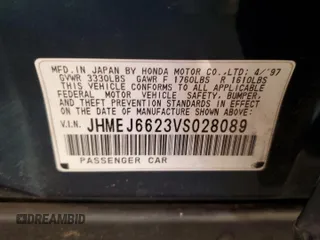 1997 Honda Civic DX with VIN JHMEJ6623VS028089, listed as a Copart auction lot 78659644 with 194,593 mi miles and Salvage Title. Bid and sale history available at DreamBid. Image 12.