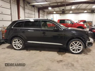 2017 Audi Q7 Prestige with VIN WA1VABF71HD043036, listed as a IAAI auction lot 42255140 with 90,009 mi miles and . Bid and sale history available at DreamBid. Image 14.