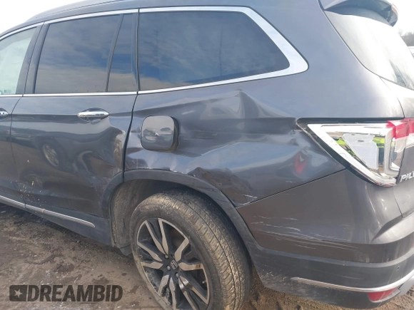 2019 Honda Pilot Touring 7-Passenger with VIN 5FNYF6H67KB018769, listed as a IAAI auction lot 41310452 with 92,499 mi miles. Bid and sale history available at carsss.com. Image 6.