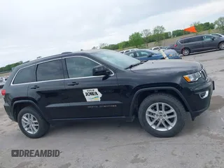 2018 Jeep Grand Cherokee Laredo E with VIN 1C4RJFAG6JC335606, listed as a IAAI auction lot 42280666 with 113,438 mi miles and . Bid and sale history available at DreamBid. Image 13.