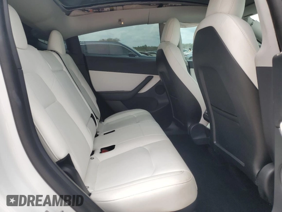 2021 Tesla Model Y Long Range with VIN 5YJYGDEE5MF203130, listed as a Copart auction lot 54642795 with 73,663 mi miles and Non Repairable. Bid and sale history available at DreamBid. Image 11.