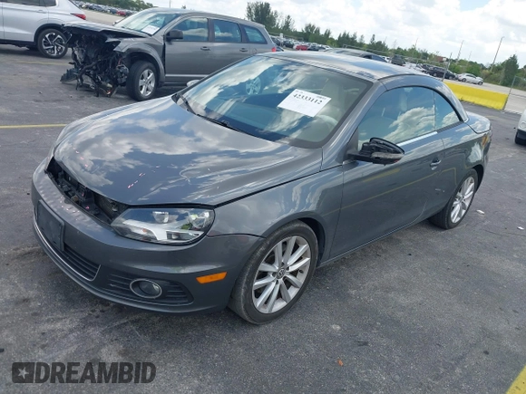 2014 Volkswagen Eos Sport with VIN WVWBW8AH2EV000313, listed as a IAAI auction lot 42333112 with 106,125 mi miles and . Bid and sale history available at DreamBid. Image 2.